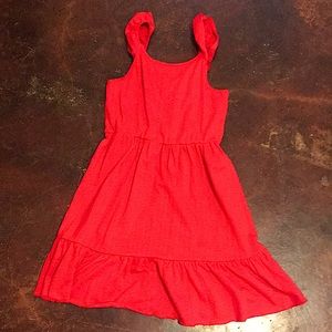 This is a nice Sumer dress! It is a pretty red and it’s size is “L 14/16”.